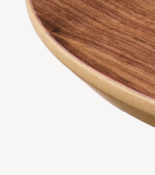 Walnut veneer with reverse chamfer, polished MDF edge